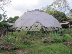 Domed greenhouse in community garden La Ecovilla
